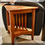 F49. Ethan Allen triangle shaped side table. 
